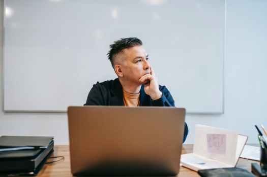 photo of man in deep thoughts